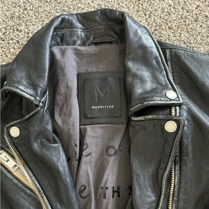 Like new wore once soft leather mojo style leather jacket. Size SM stylish.